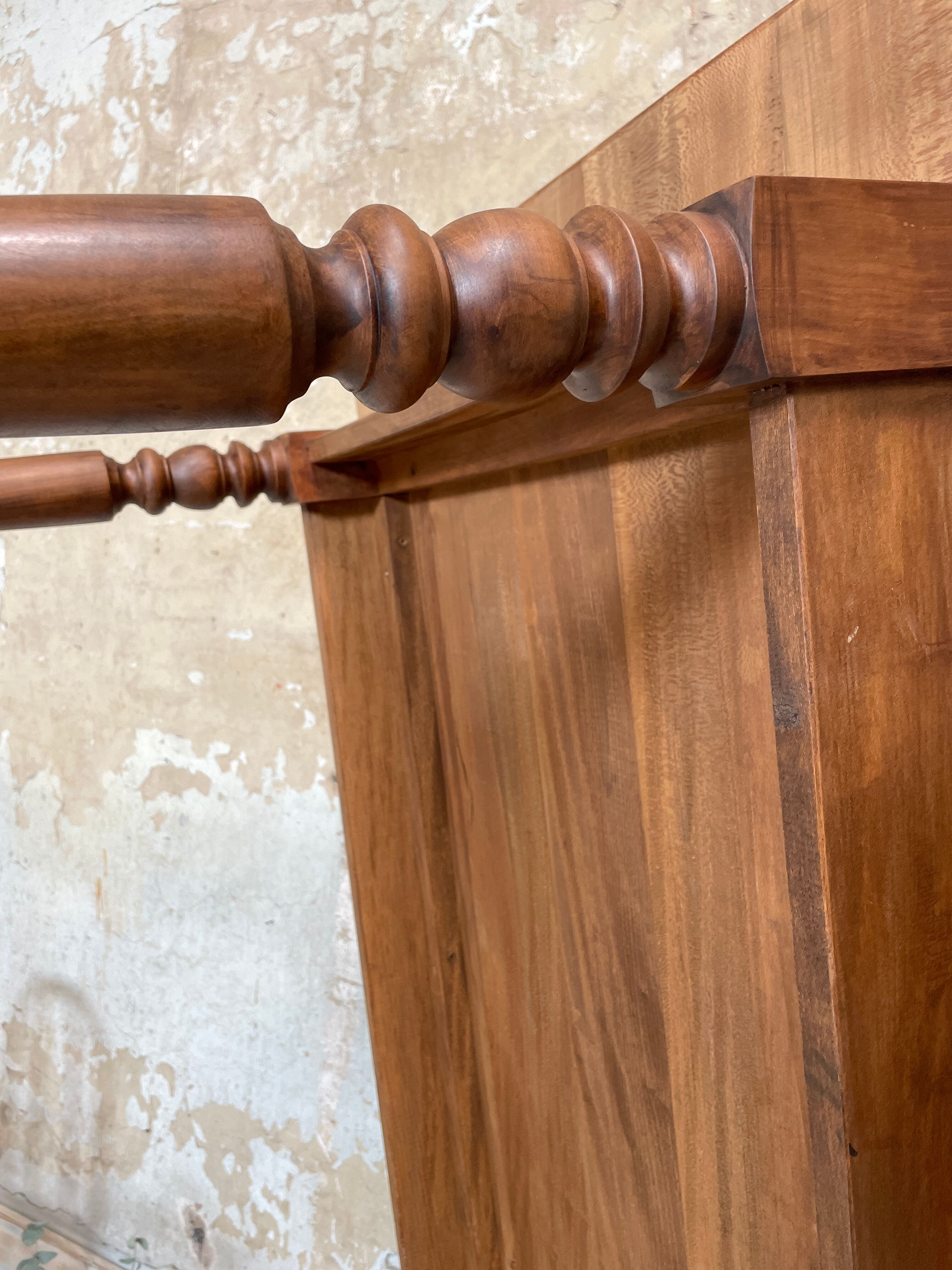 Vintage farmhouse table with turned legs.