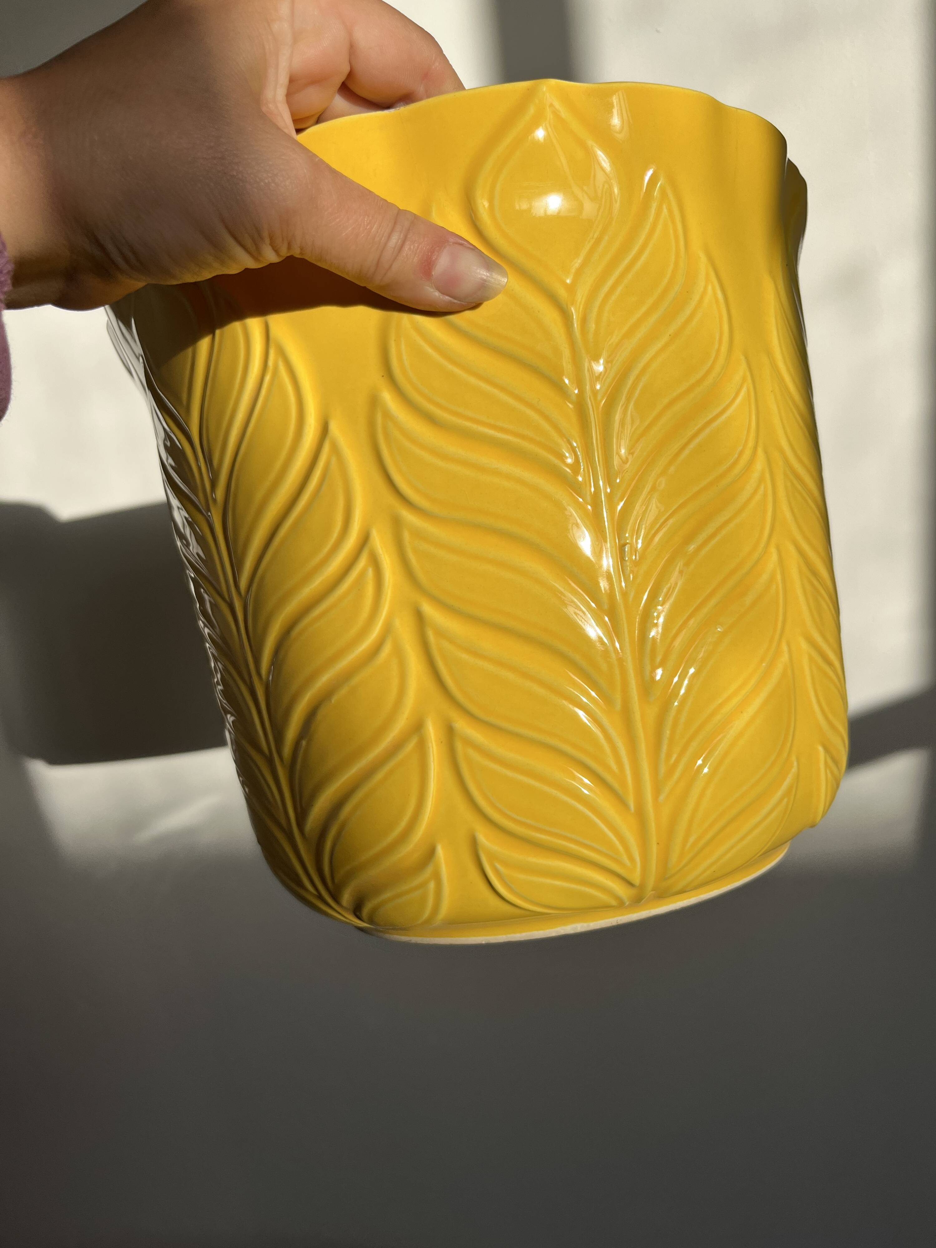 Yellow ceramic plant pot