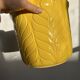 Yellow ceramic plant pot