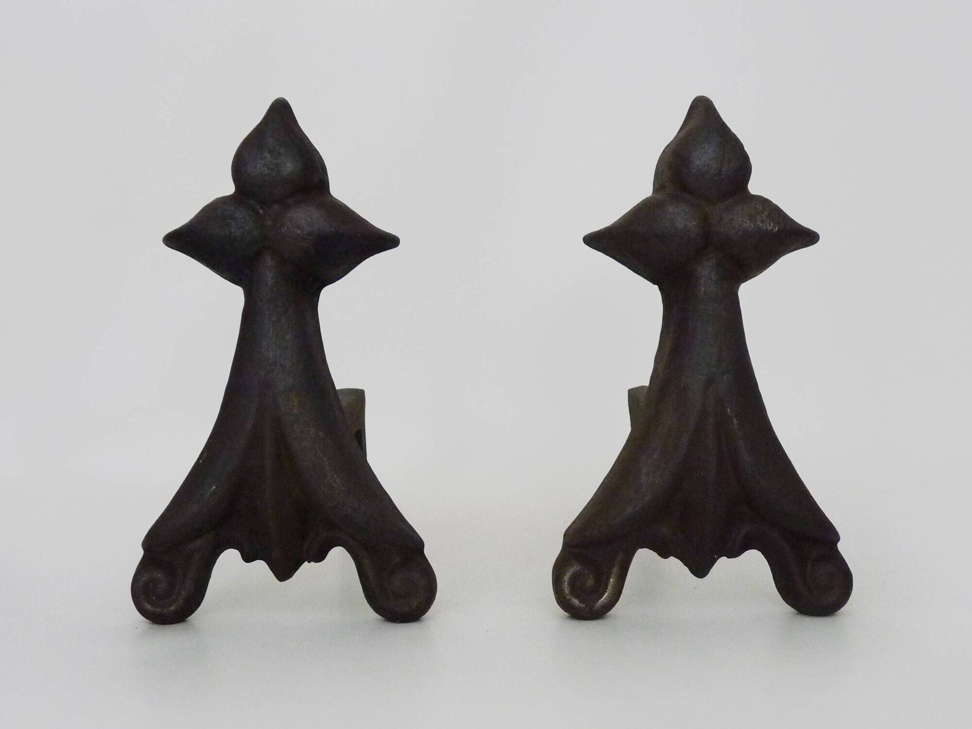 Pair of cast iron fireplace andirons. France, 19th century.
