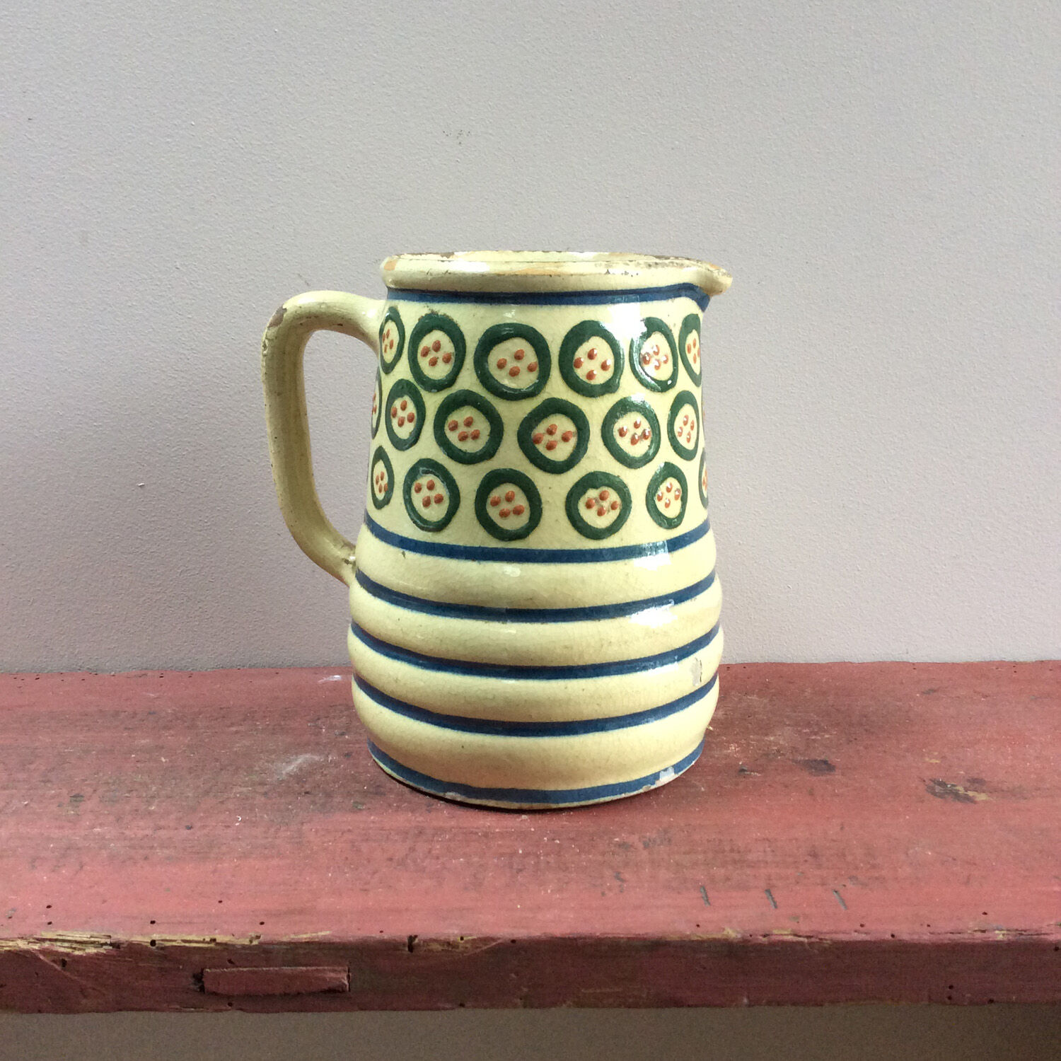Glazed pottery pitcher
