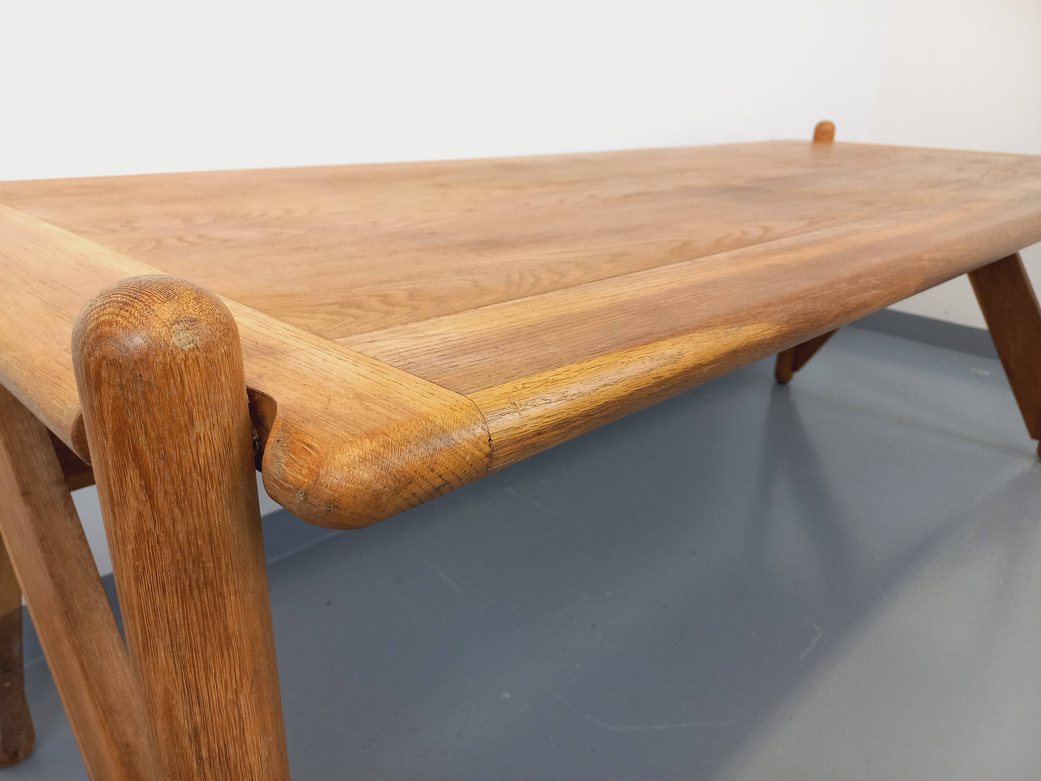 Large vintage brutalist rectangular table made of solid oak wood.