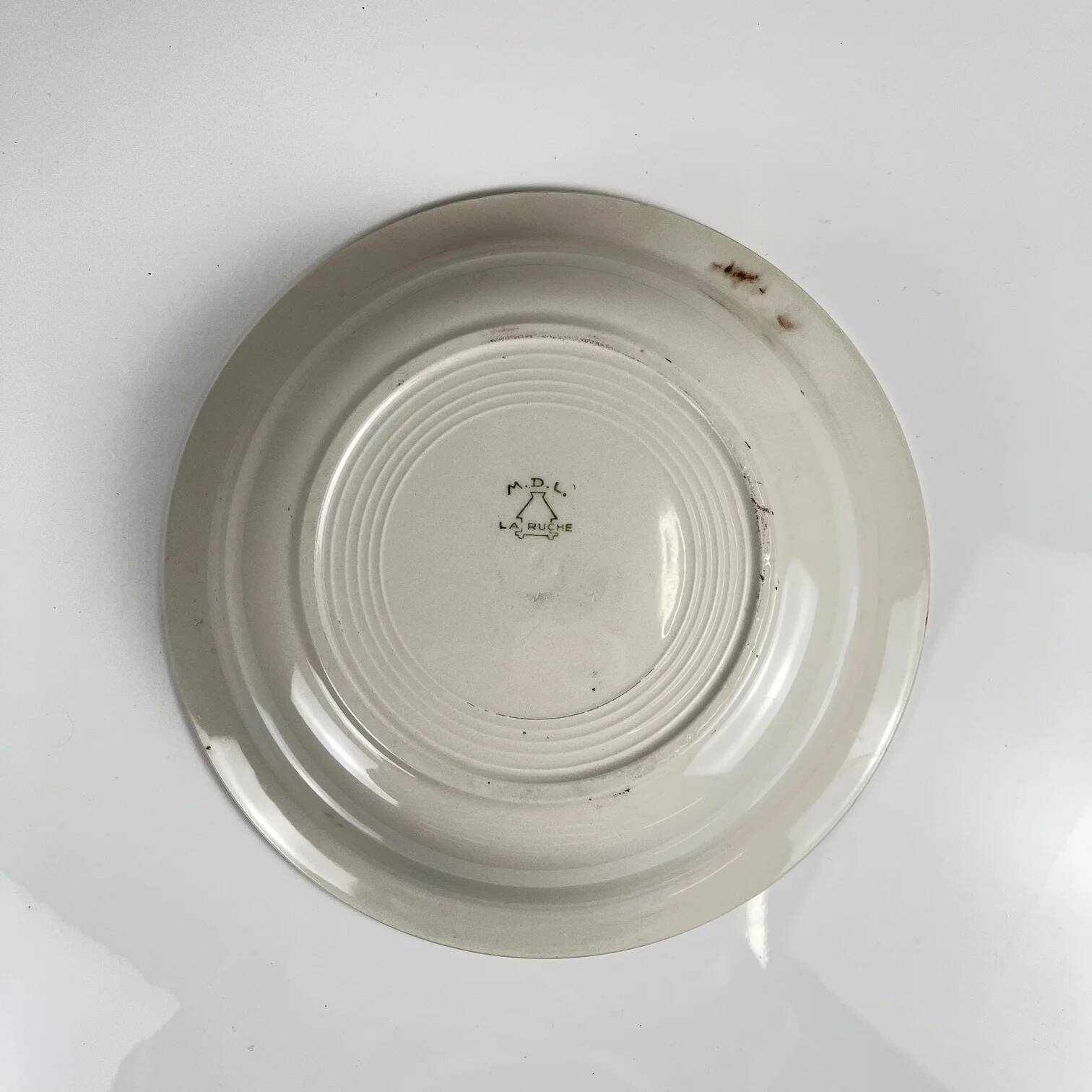 Round plate with rim "The Hive", Moulins des Loups, 20th century