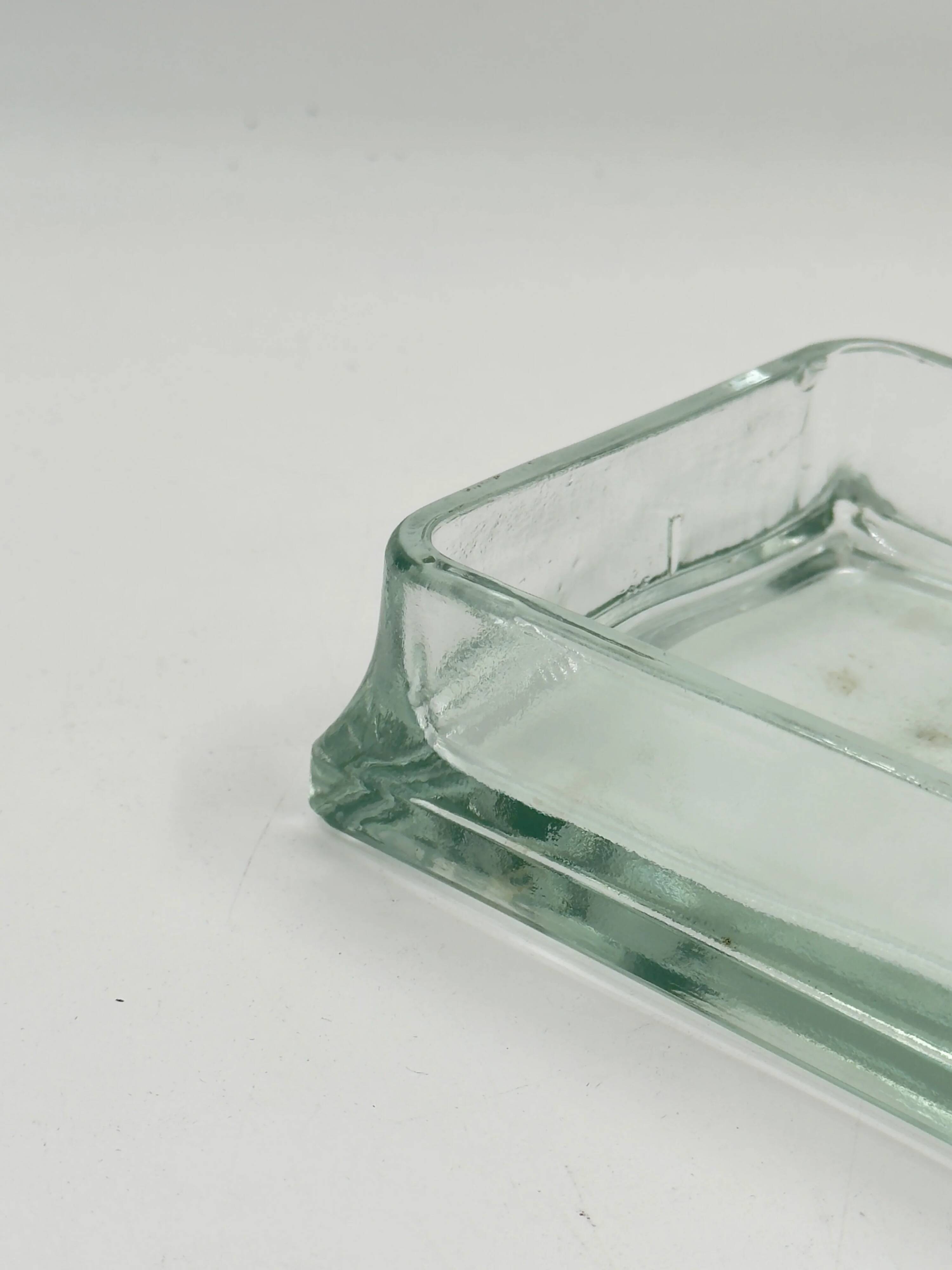Vintage rectangular plateau in thick pale green glass.