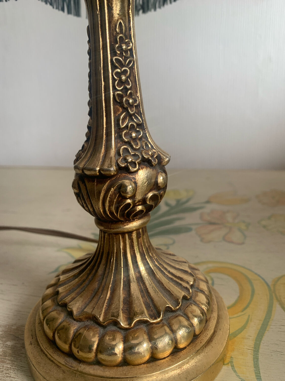 Vintage Neo-Rococo bedside lamp with fringed shade.