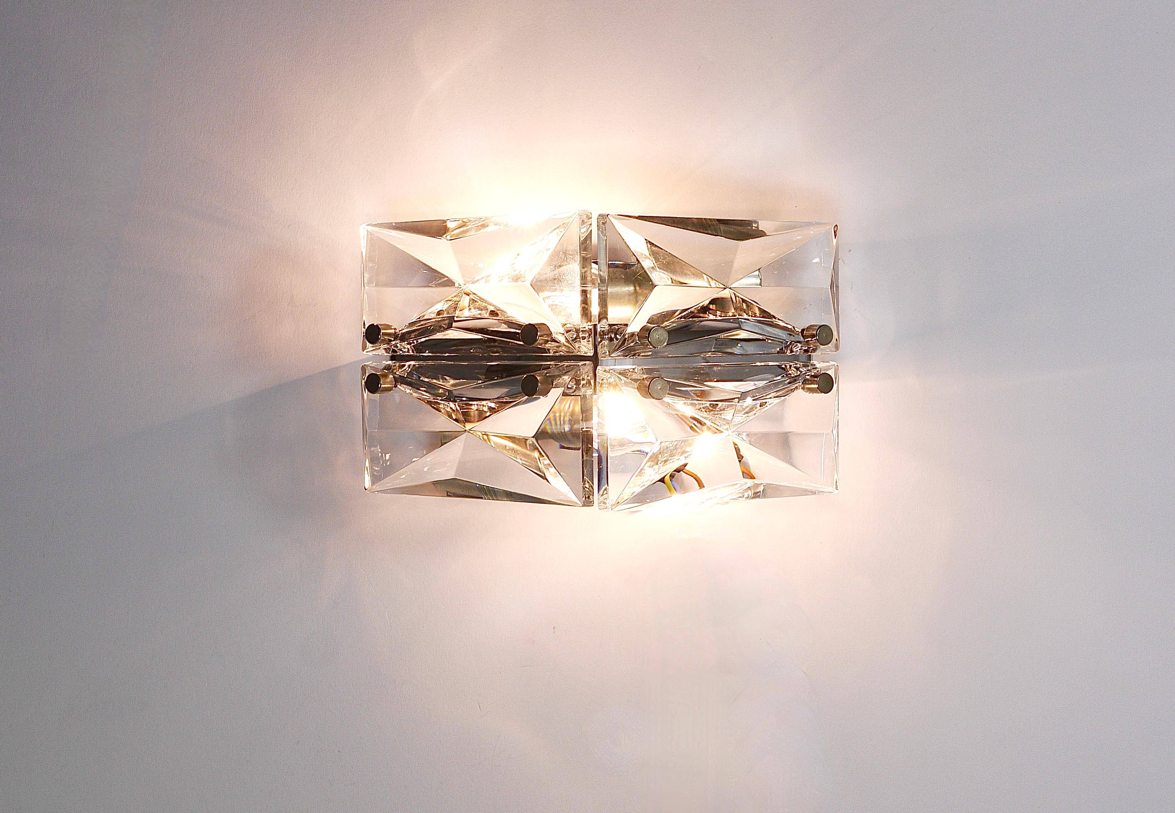 Pair of wall sconces in faceted crystal and chrome / prism glass wall lamps by Kinkeldey