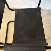 Set of 12 vintage black leather and tubular steel chairs – Italy, year
