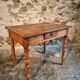 French vintage side table in cherry wood with a drawer.