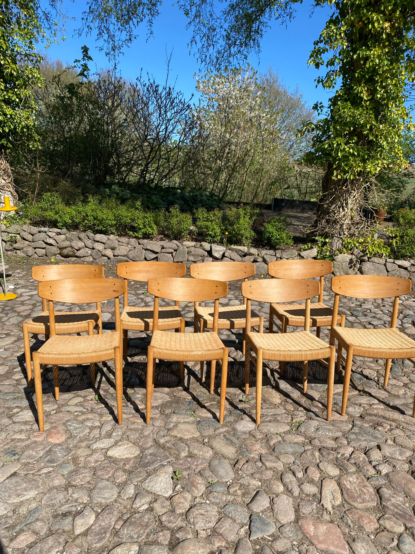8 dining chairs in oak  w/ paper cord