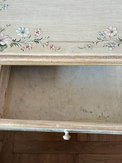 exotic wood console with a drawer