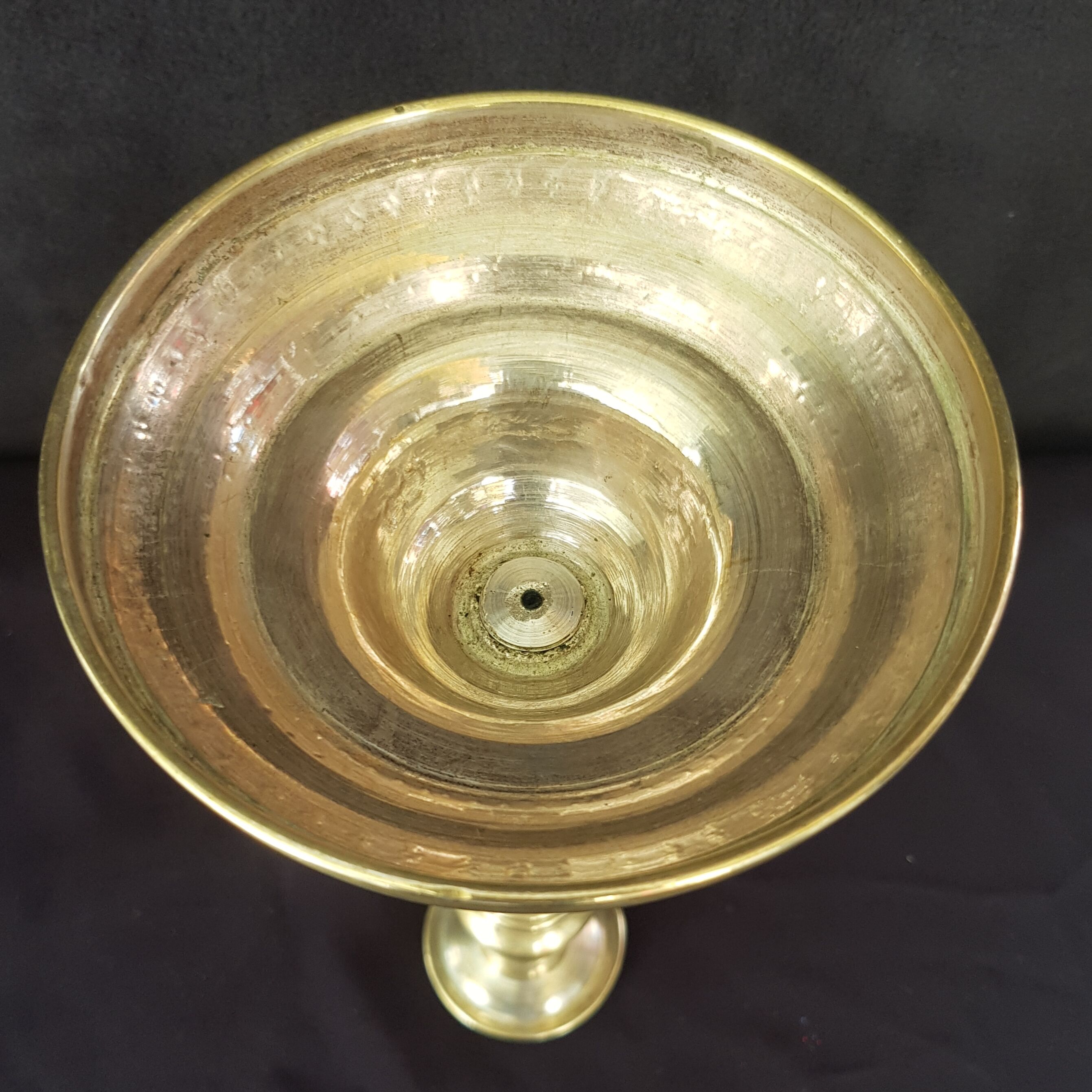 Chiseled gilded metal candlesticks