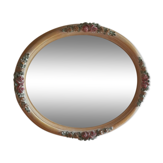 Oval-shaped bevelled mirror with cherry wooden frame 60x47cm