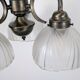 Antique Art Deco chandelier with 3 arms in patinated metal and ribbed glass.
