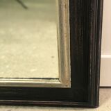 Trumeau mirror in black and silver patinated wood in Louis XV style