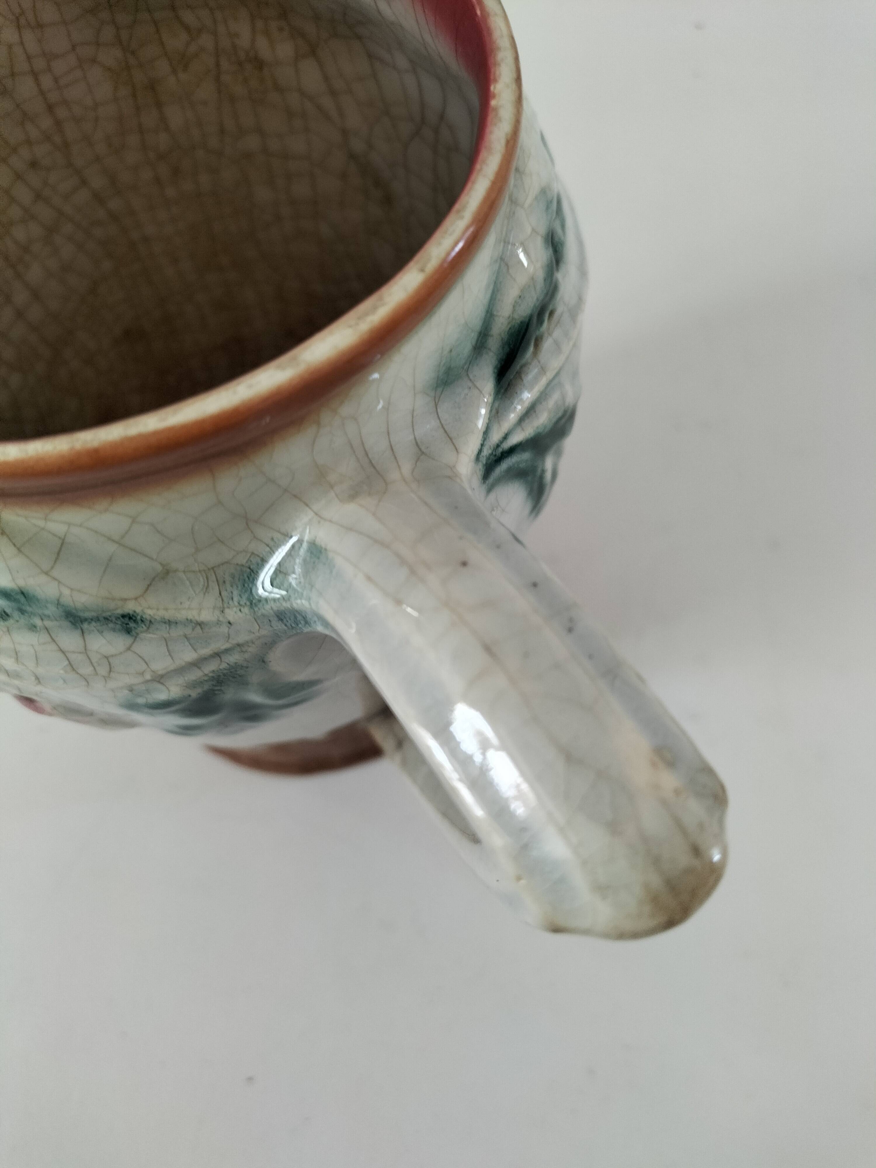 Moulded slip pitcher - late 19th century - Floral decoration in relief