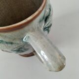 Moulded slip pitcher - late 19th century - Floral decoration in relief