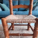 4 chairs and stools, brutalist art, straw and wood