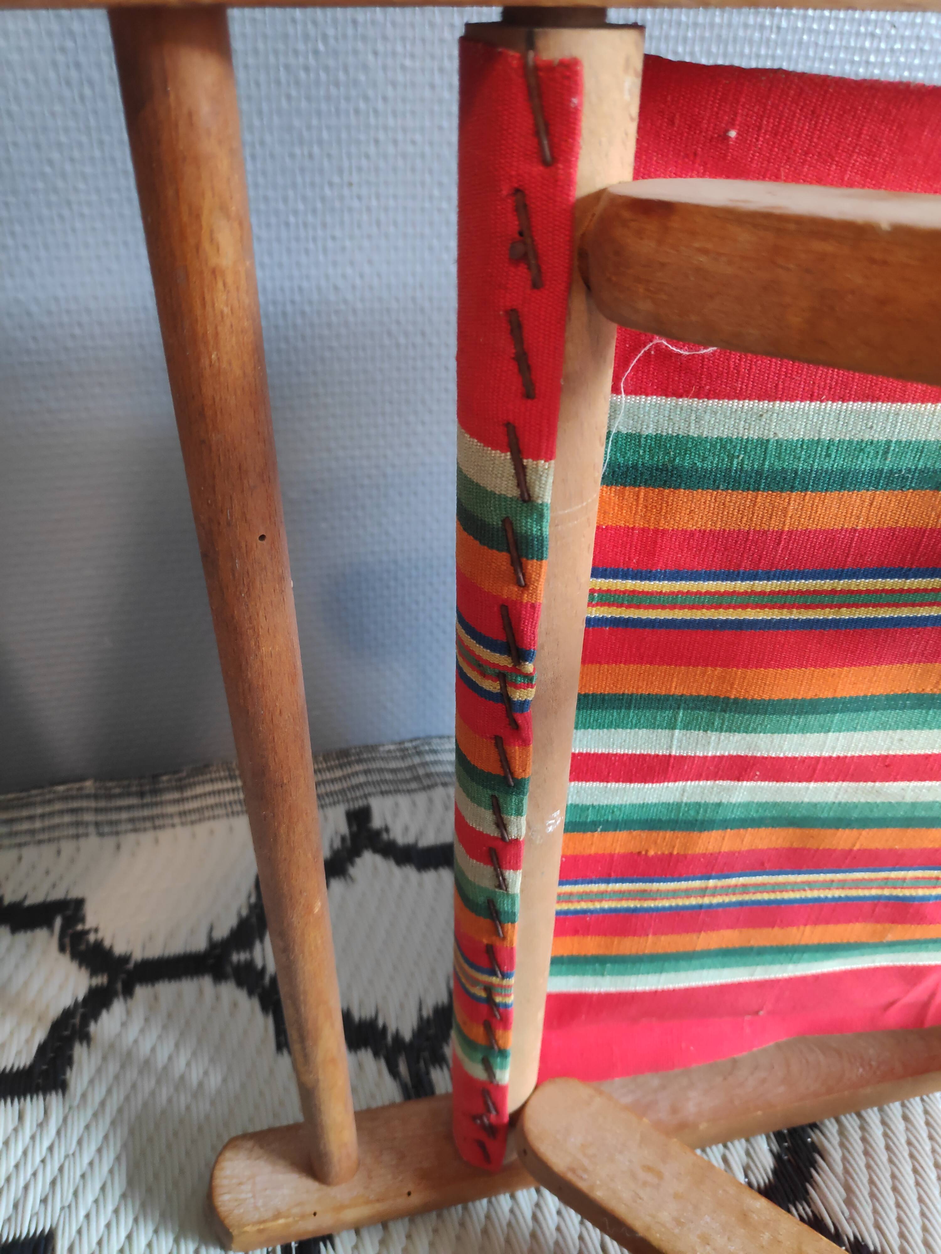Vintage wooden folding chairs and basque fabric
