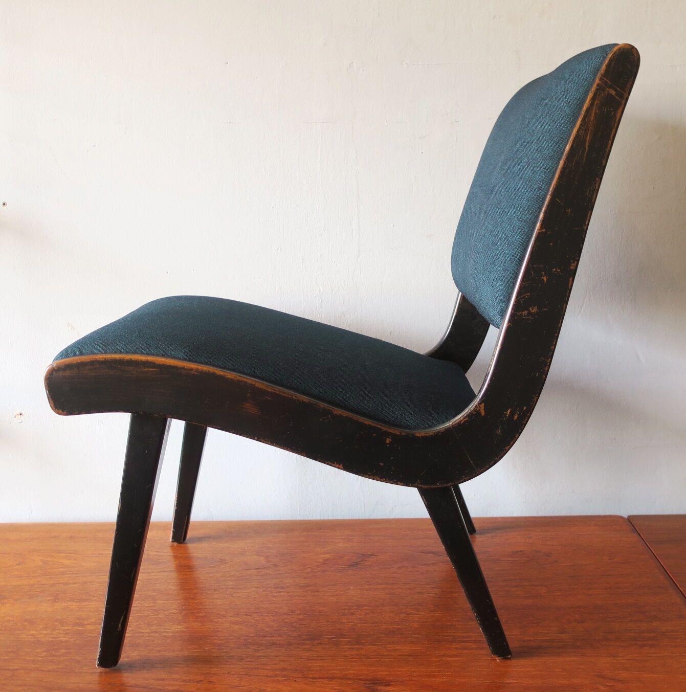 Jens Risom armless chair with ebonized frame and petrol blue-green covers