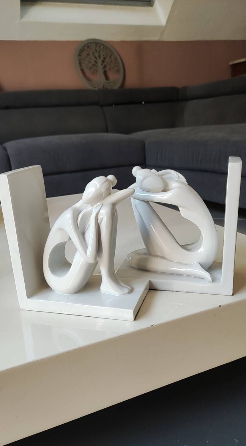 Paire de serre-livres figurines féminines