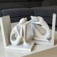 Paire de serre-livres figurines féminines