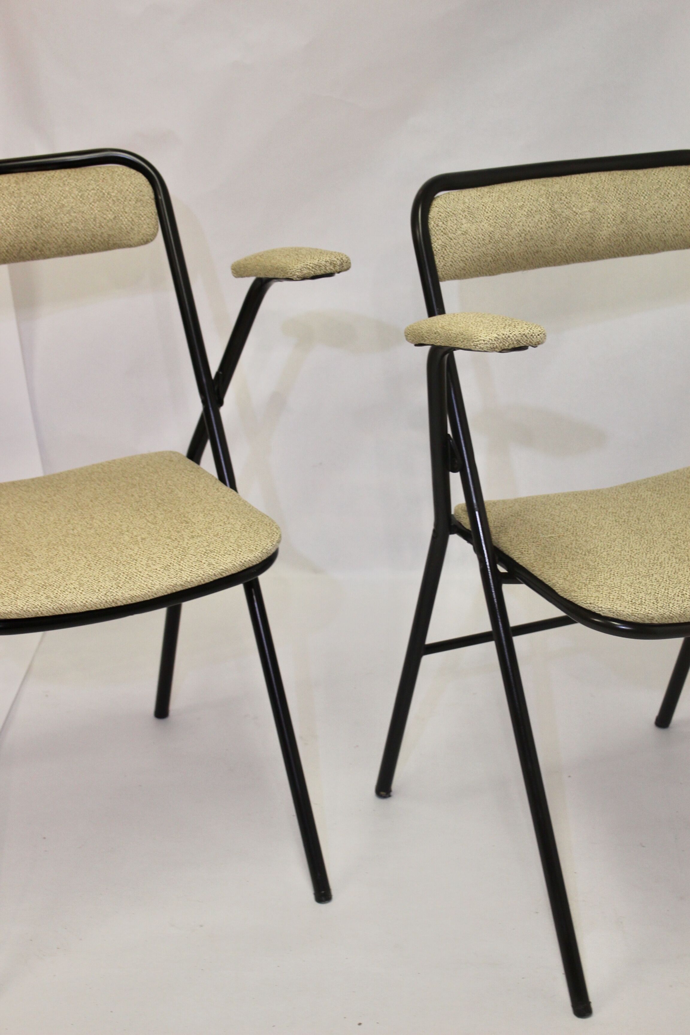 Pair of folding chairs with vintage armrests, 70s