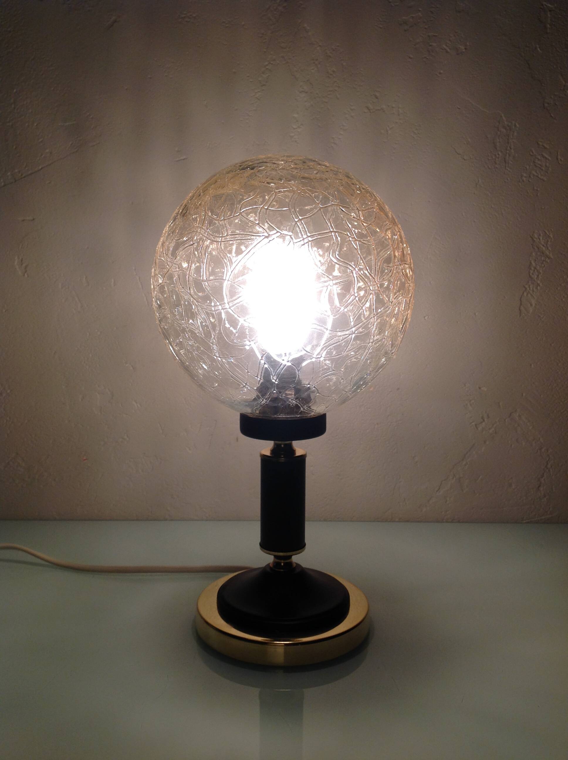 Structured amber glass globe lamp on black and brass base by Solken Leuchten/ 60s-70s