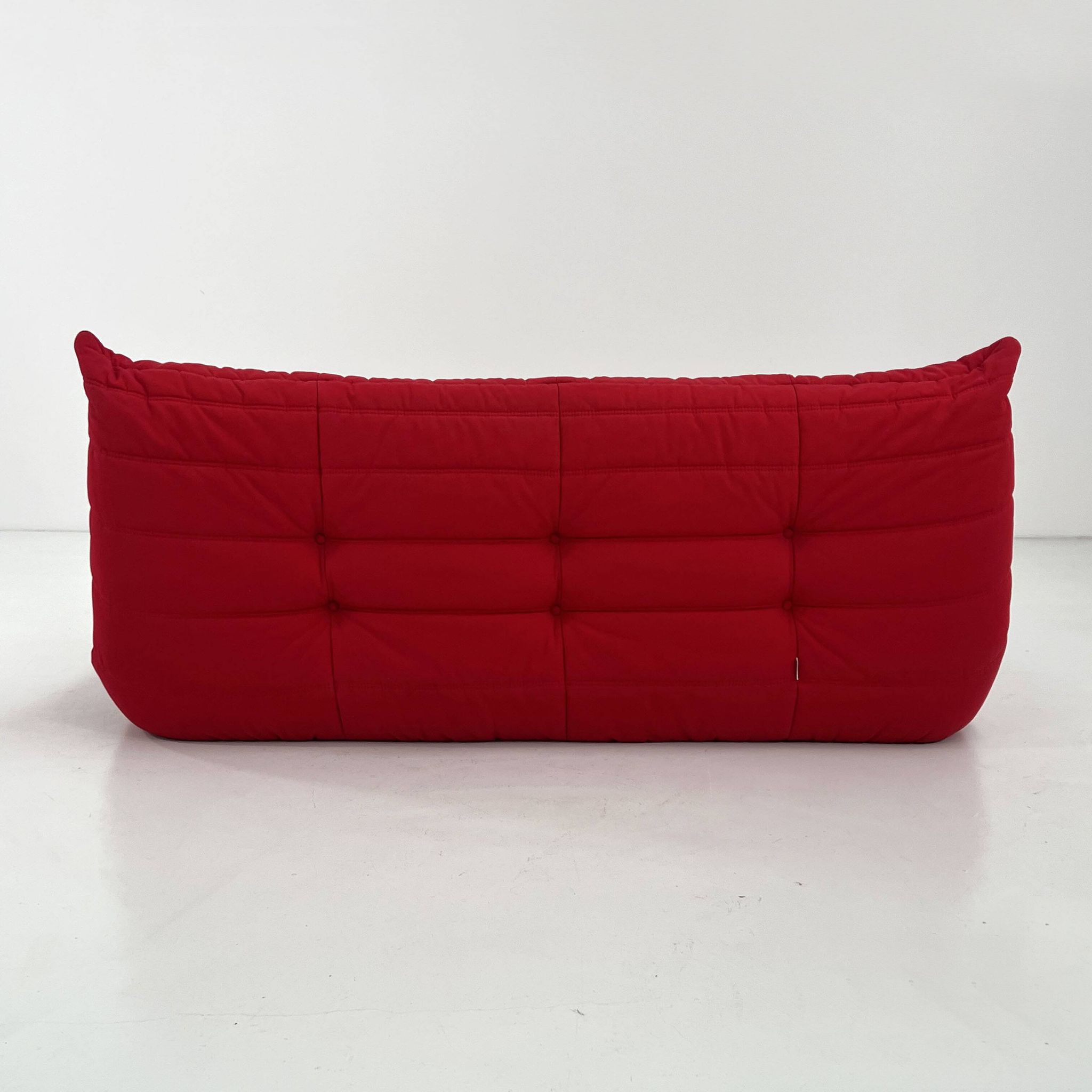 Togo 3-seater with red ottoman by Michel Ducaroy for Ligne Roset, 1970.