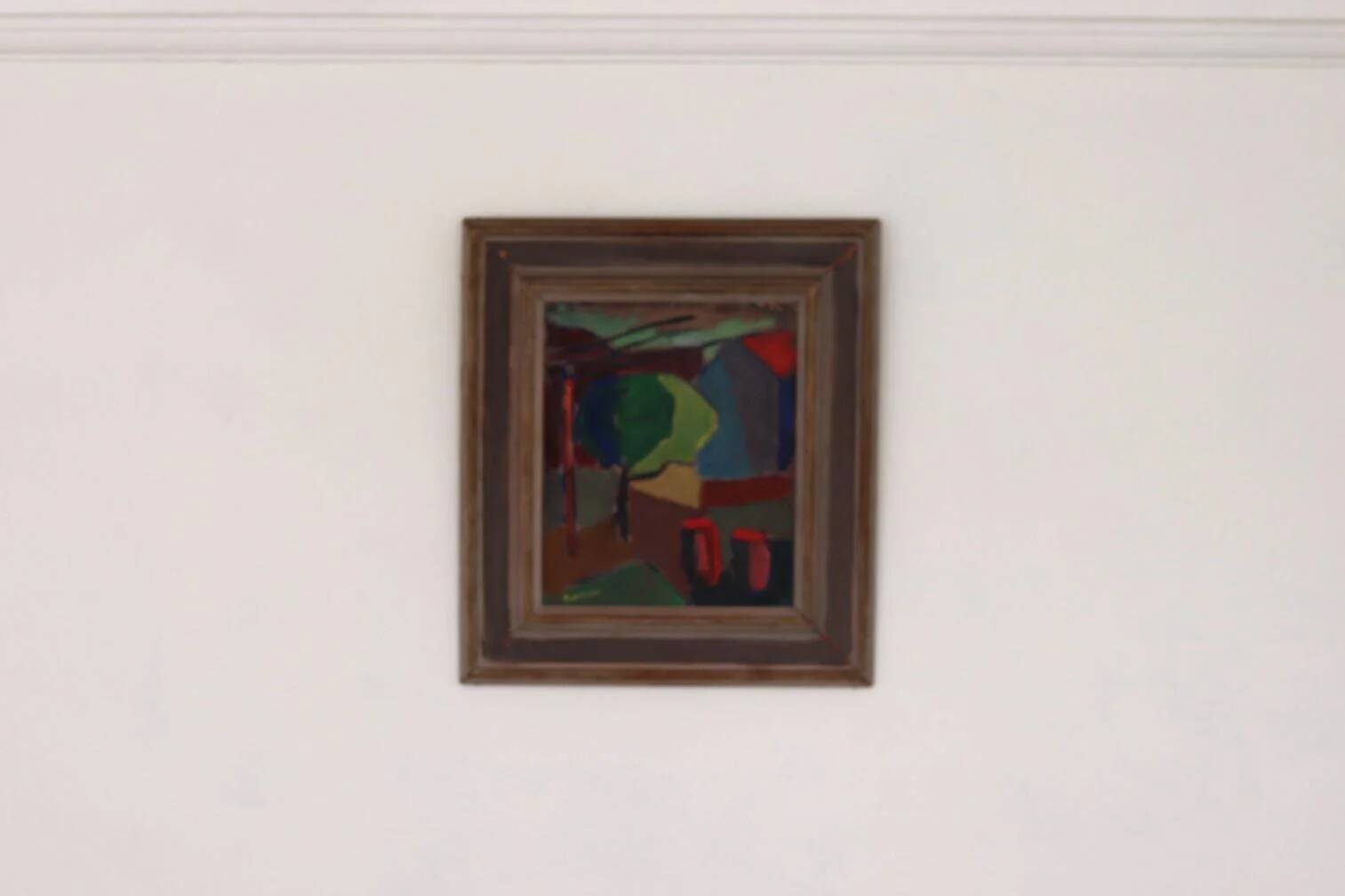 House obscured by a tree by Harry Martinson