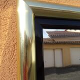 Brass and plexiglass mirror, 80s design