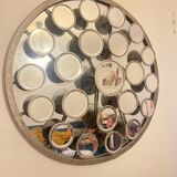 Mirror with round facets design