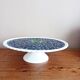 Pie dish on foot, in slip with blackberry decoration