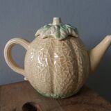 Teapot coffee maker pitcher melon in slippery water