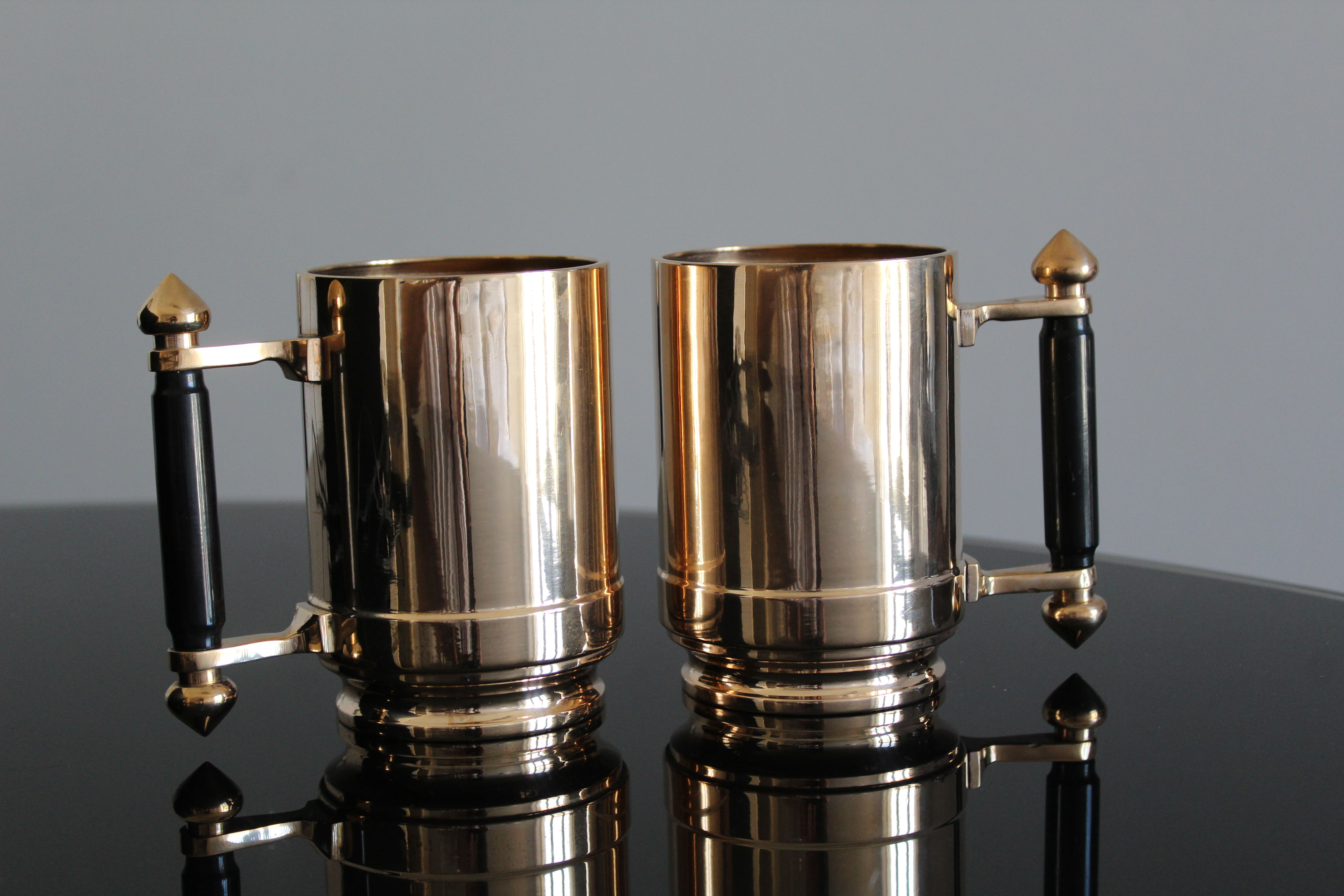 Pair of art deco bronze beer mugs France, 1940s, signed Bronze Star