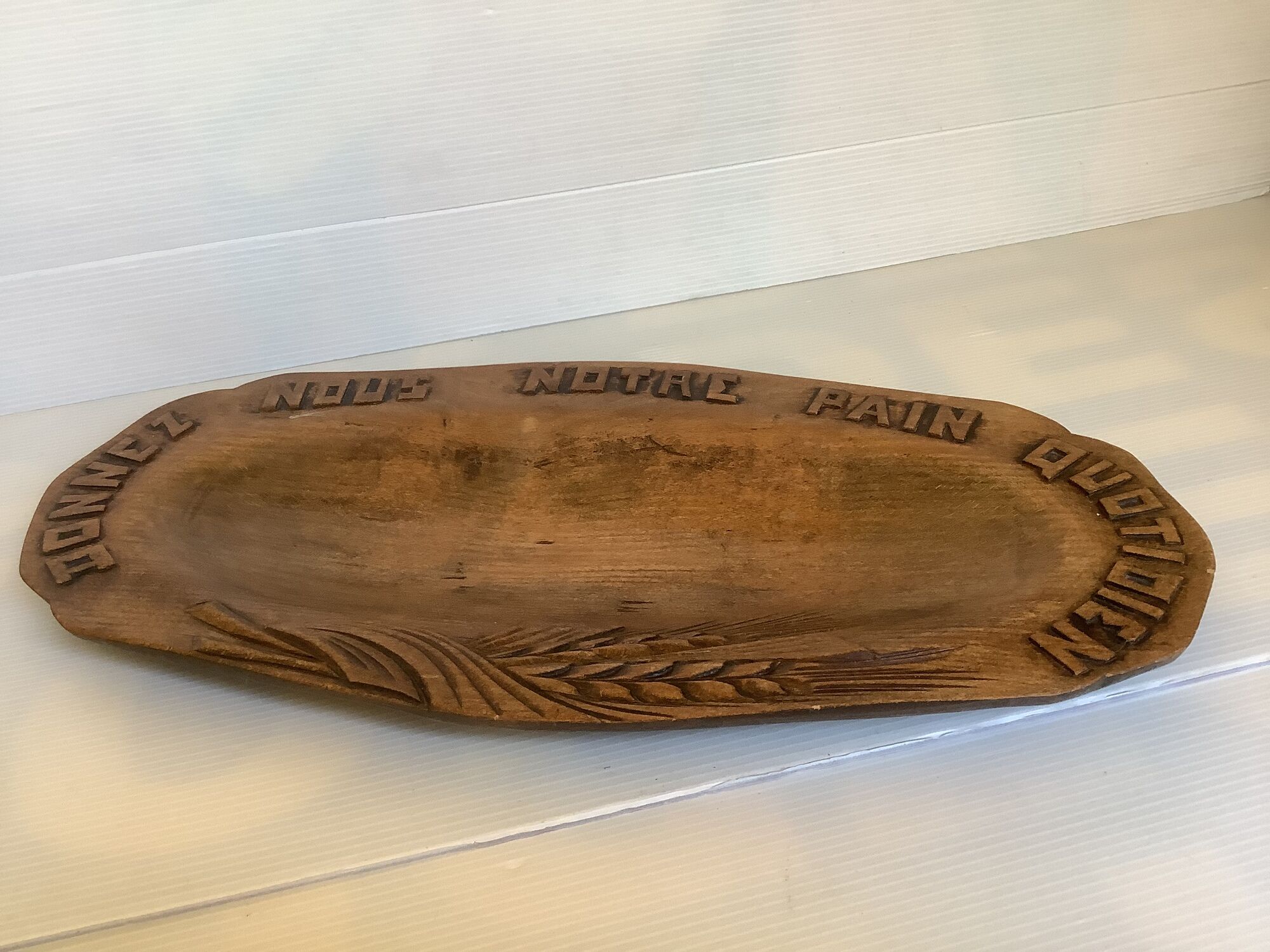 Carved wood dish ears of wheat give us our daily bread