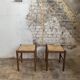 Pair of 20th century wooden stools with straw seats