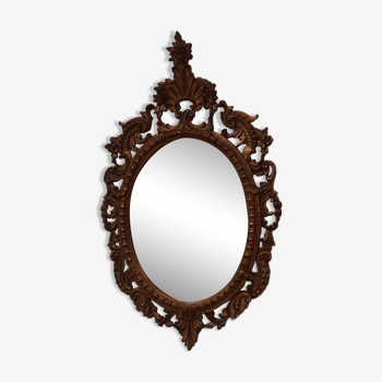 Italian mirror in gilded scupted wood