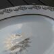 Plat ovale en porcelaine .signé LJ & cie