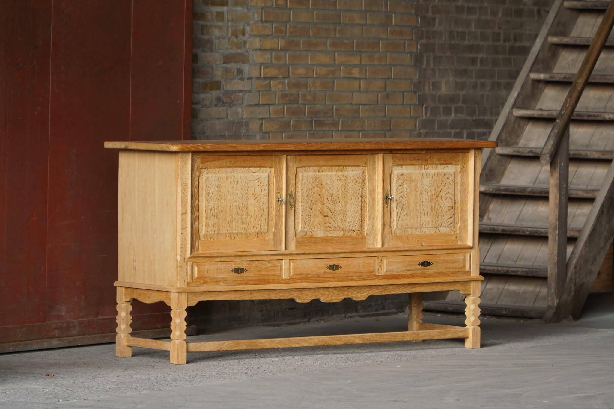 Brutalist Danish enfilade from the mid-century in oak by Henning Kjærnulf, 1960s.