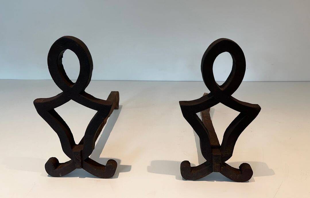 Pair of Modernist Andirons in Cast Iron with Stylised Figure Supports, by Ray