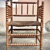 Antique Bobbin armchair with straw seat