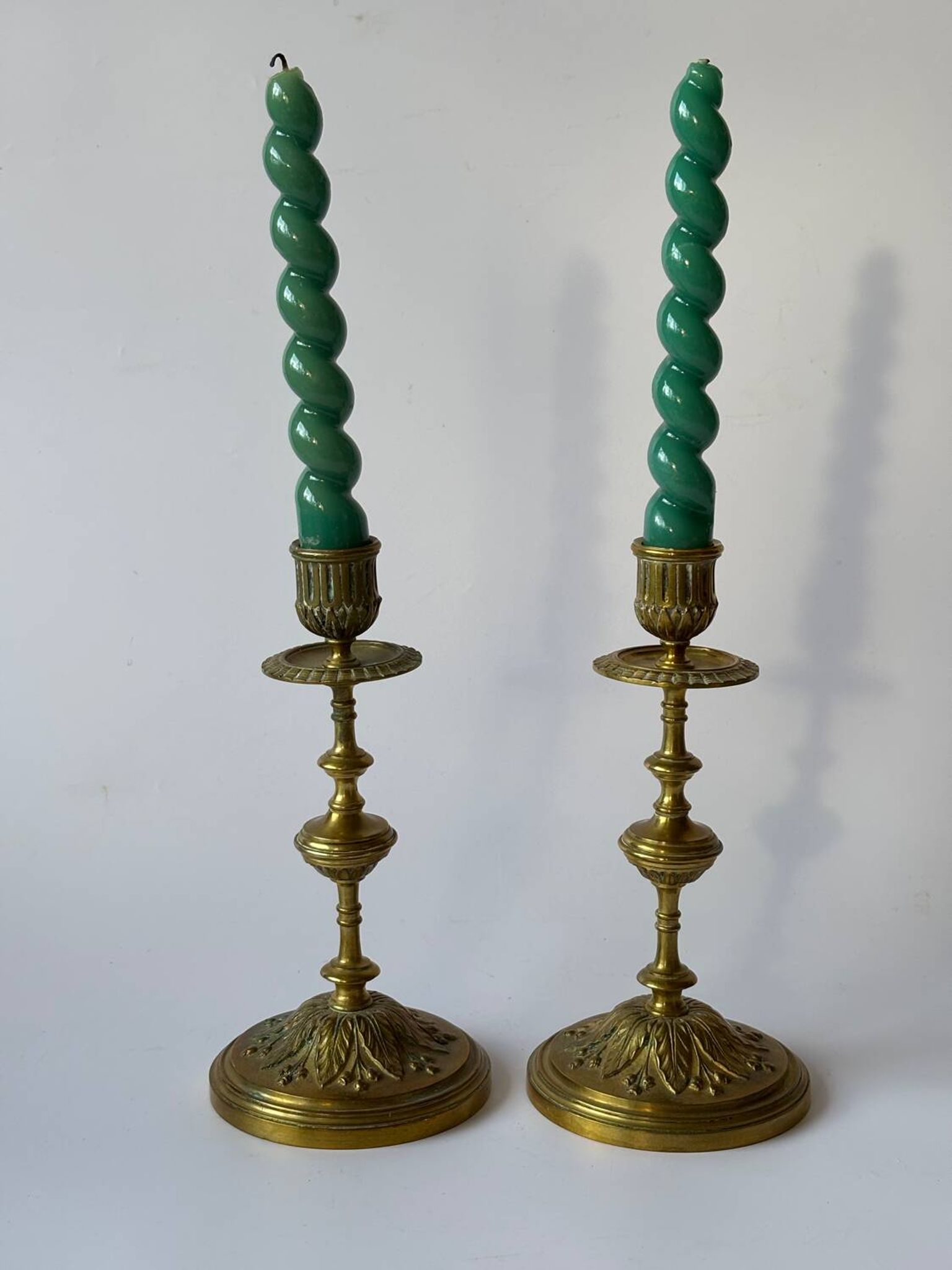 Pair of neoclassical brass candlesticks