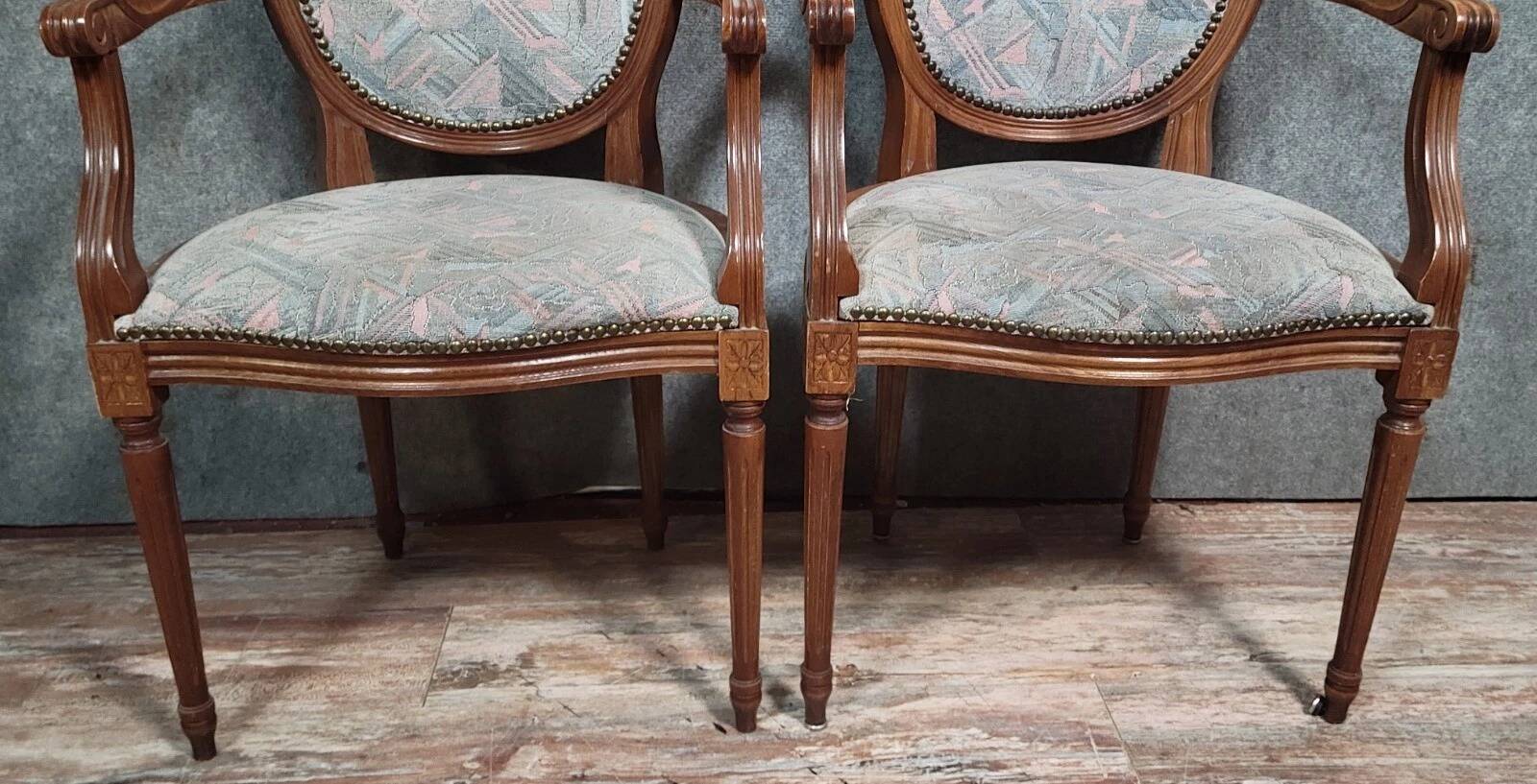 Pair of Louis XVI style armchairs with medallion backs, 20th century