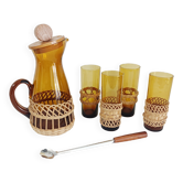 Orangeade service in amber glass and wicker