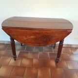 Table ronde à volets ancienne