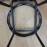 Chair in natural rattan and black metal