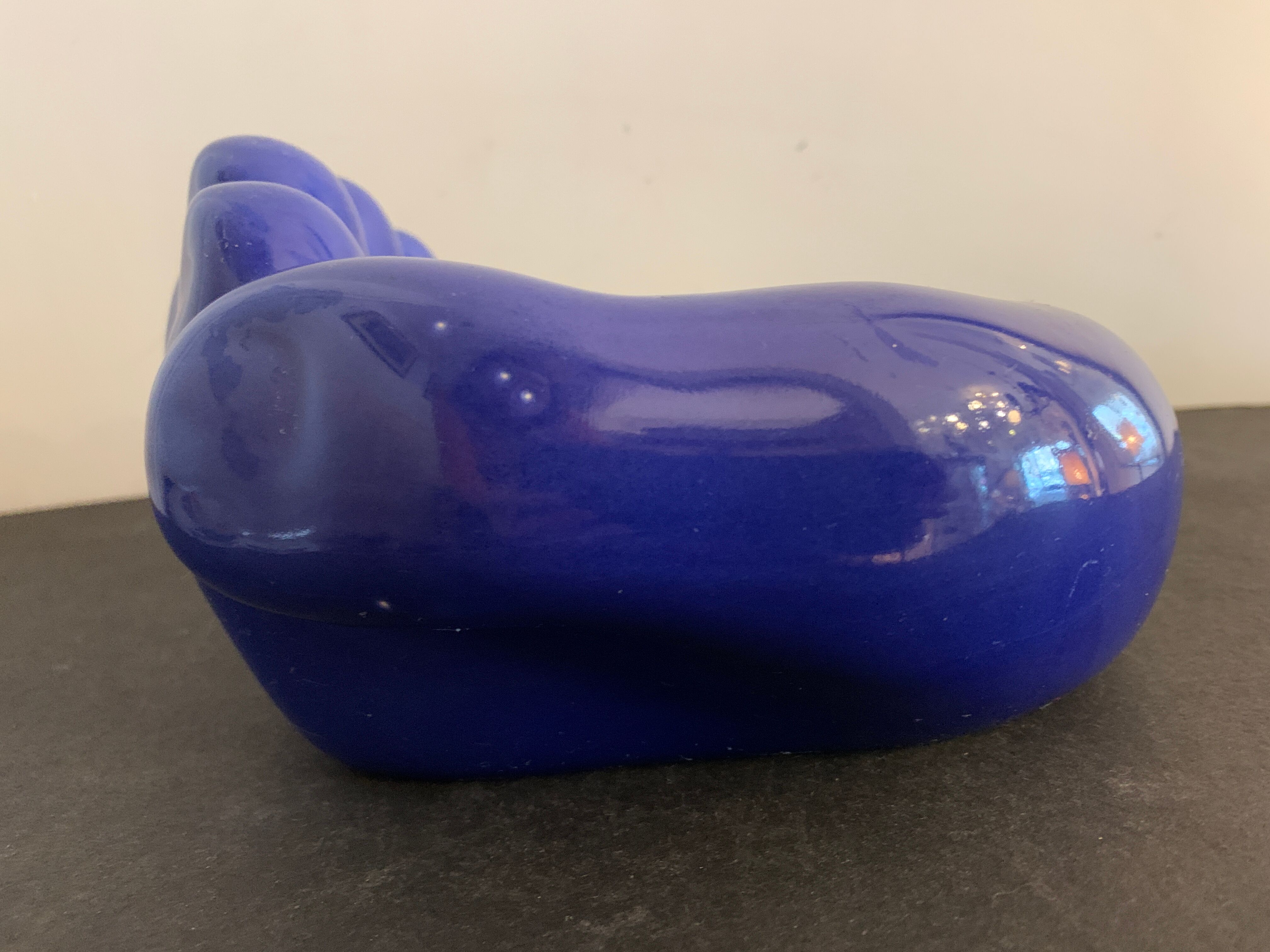 Ceramic ashtray, blue hand shape