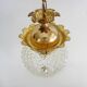 Brass and diamond-tipped chiseled glass globe hanging lamp