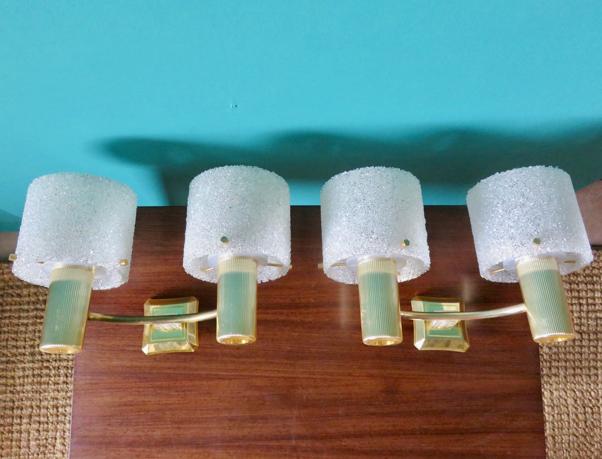 Pair of brass and gold plastic sconces with granite lampshades, France 1950