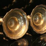 Pair of 19th bronze candlesticks with Regency-style chiseled decoration